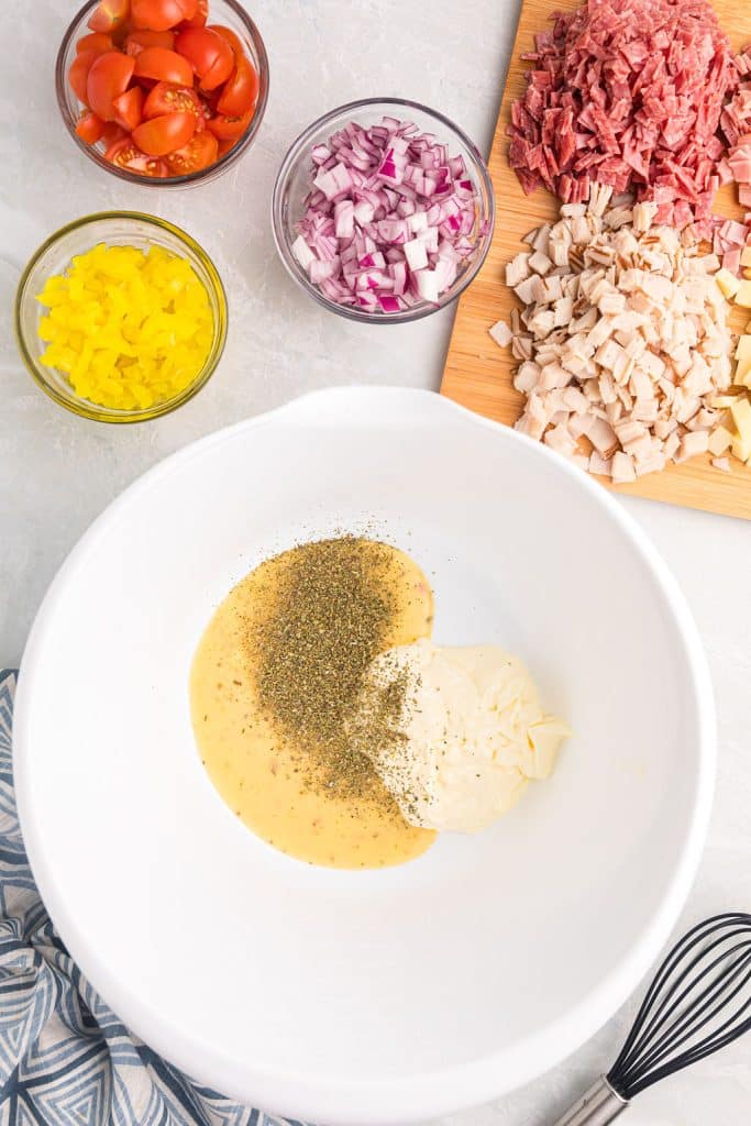 overhead shot of dressing in a white bowl.