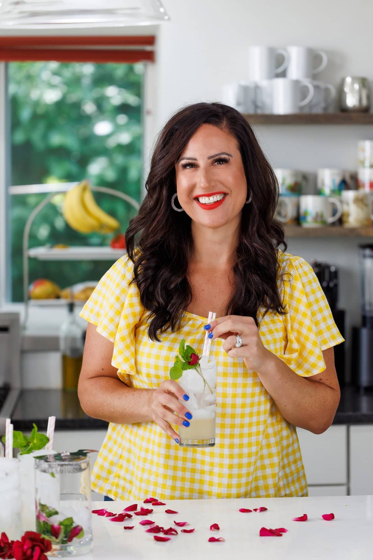 Liz drinking rose water cooler.