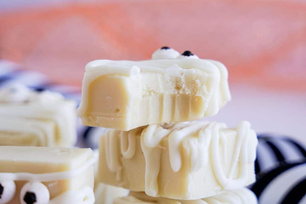 stack of white fudge with a bite missing.