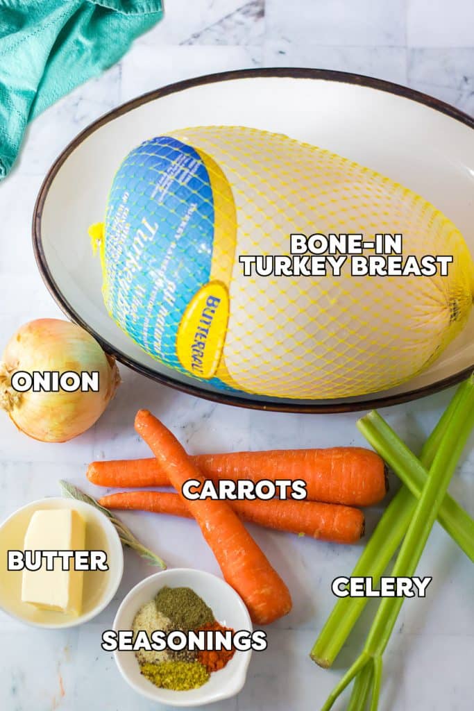 overhead shot of labeled ingredients laid out to make a turkey breast in a crockpot.