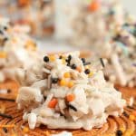 closeup of crockpot candy with halloween sprinkles.