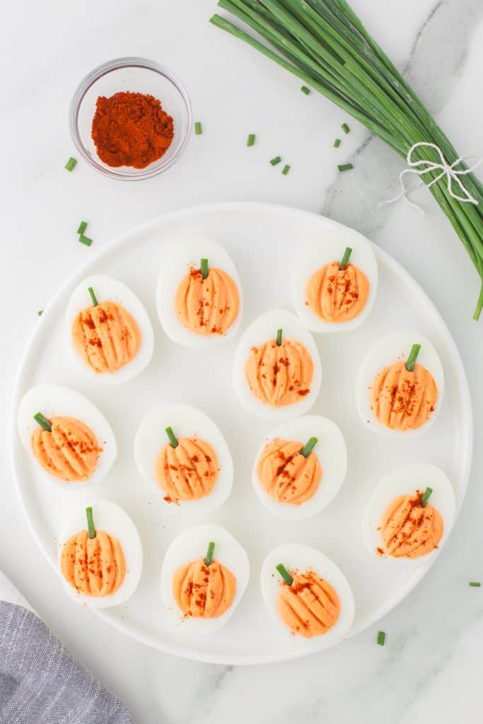 deviled eggs sprinkled with paprika.