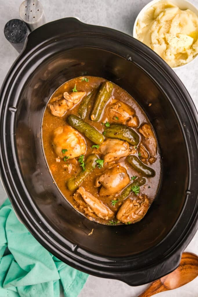 overhead shot of crockpot pickle chicken in a crockpot.