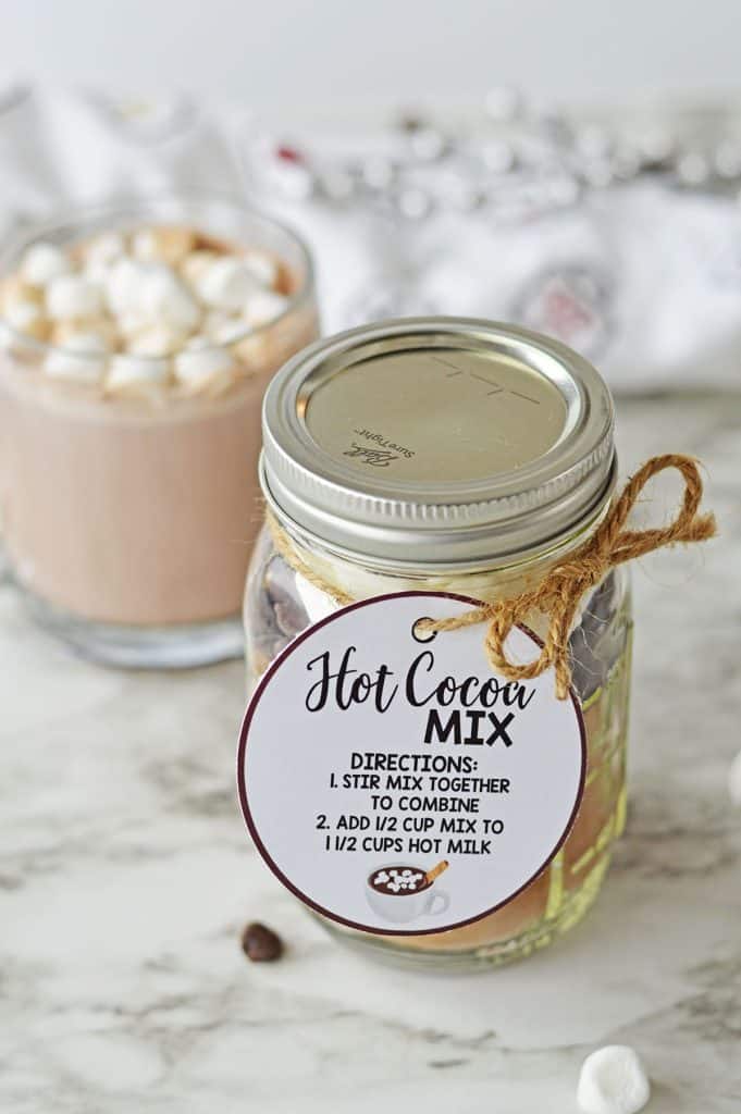 jar of homemade hot cocoa mix with gift tag.