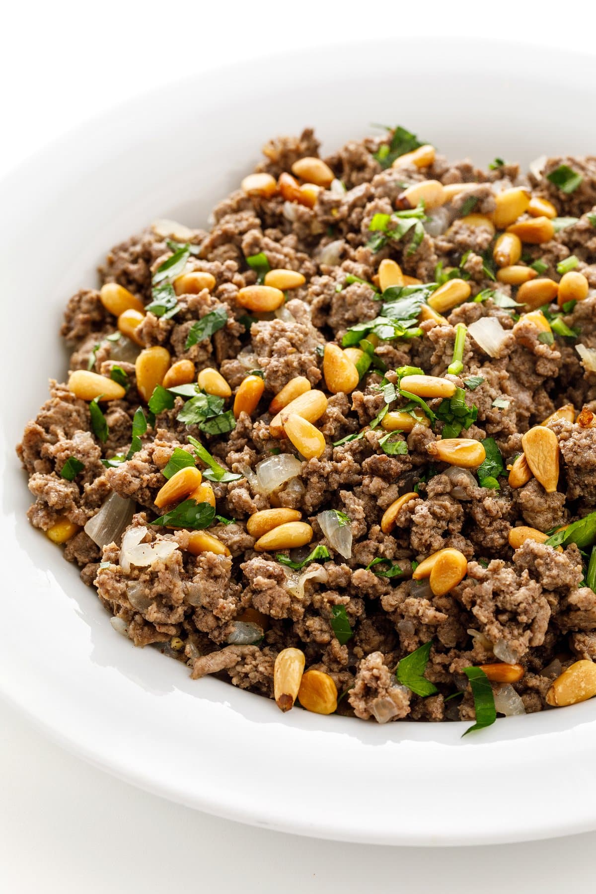 Lebanese hushwee- ground beef with pine nuts.