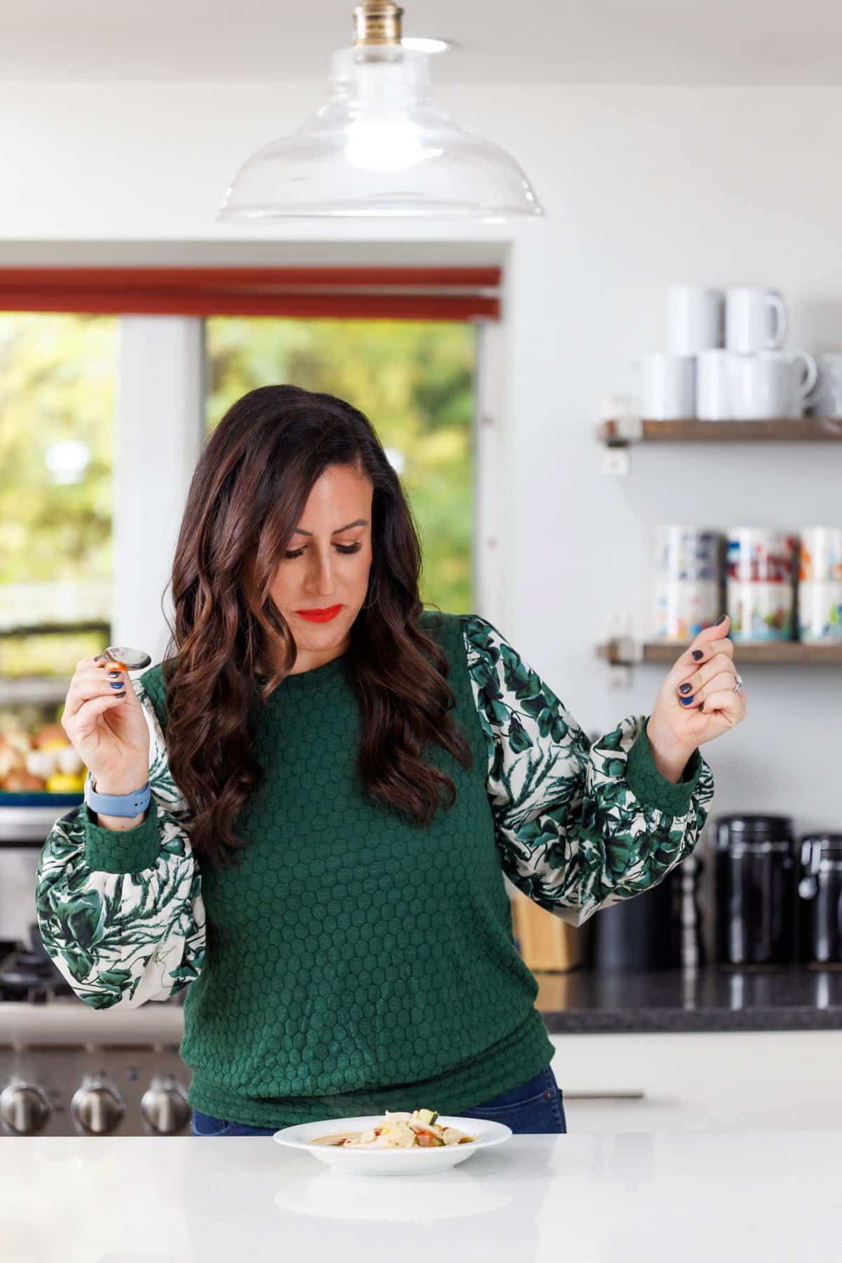 Liz enjoying chicken tortilla soup with hominy.