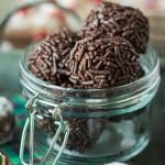 glass jar of chocolate rum balls.