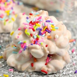 white chocolate crockpot candy with rainbow sprinkles.