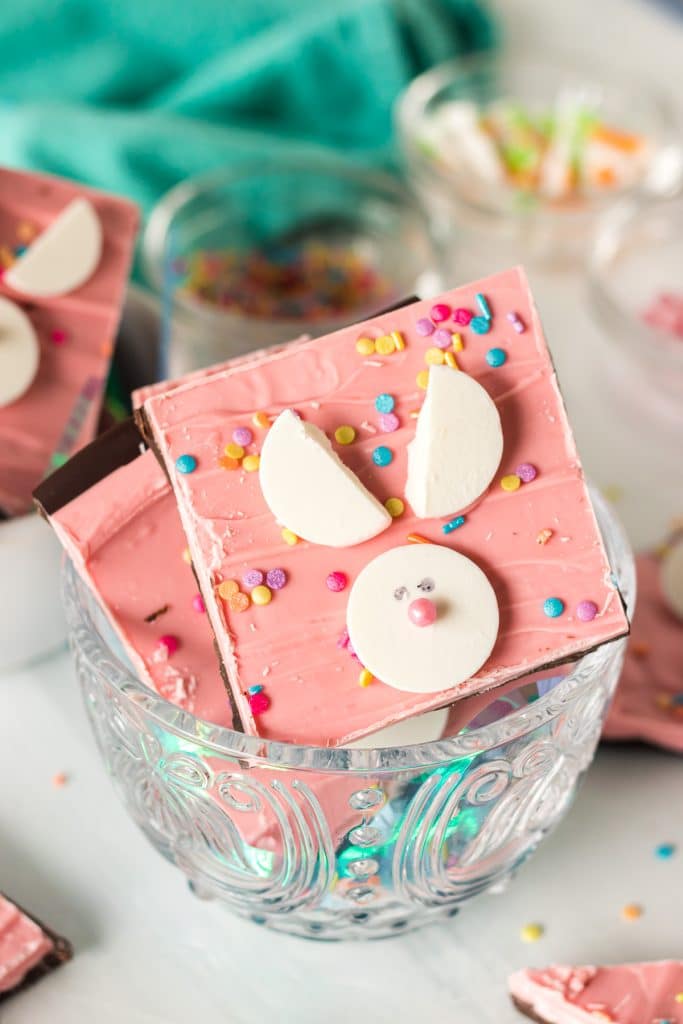 pink candy bark in a glass disk.