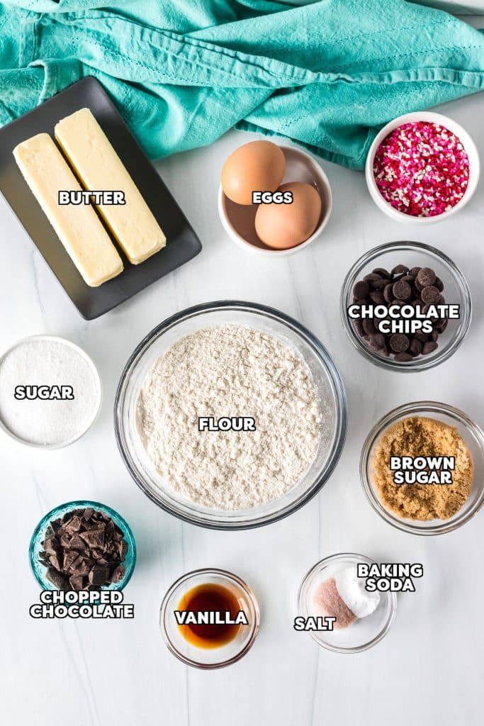 overhead shot of labeled ingredients laid out to make chocolate chip cookies.