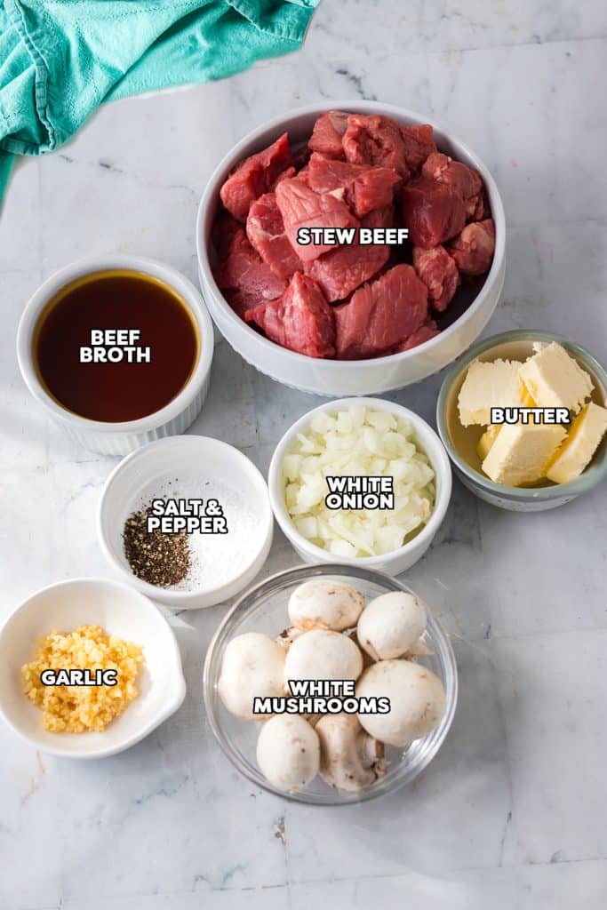 overhead shot of labeled ingredients laid out to make mushroom steak bites.
