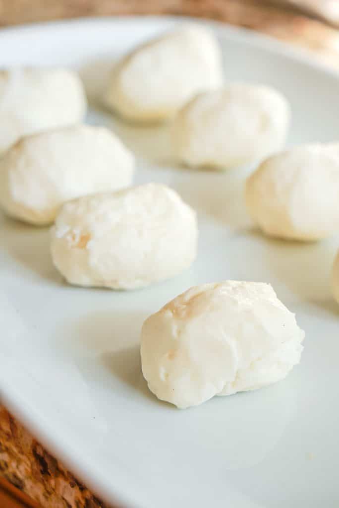 white oblong candies shaped like potatoes.