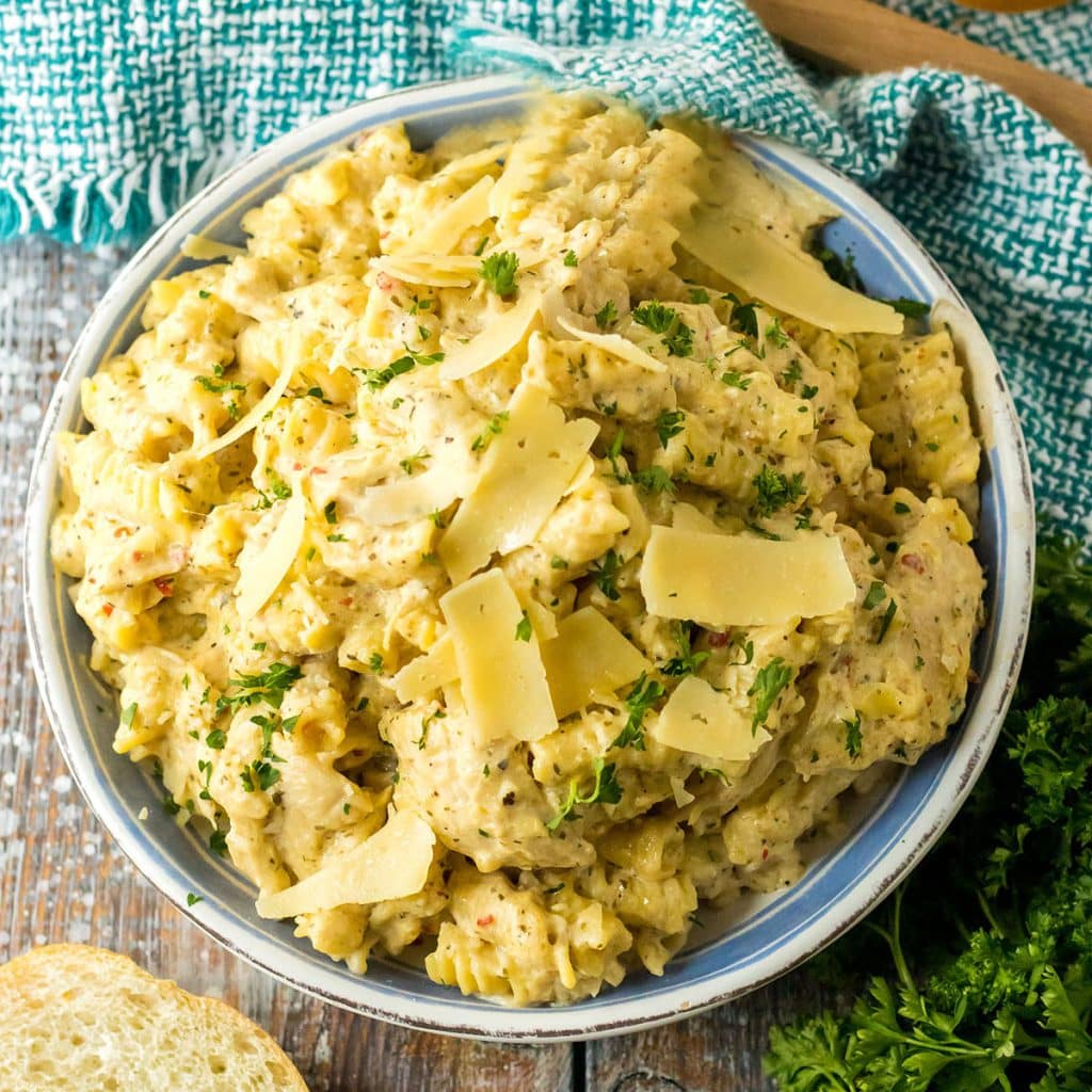 overhead shot of a bowl of garlic parmesan chicken pasta.