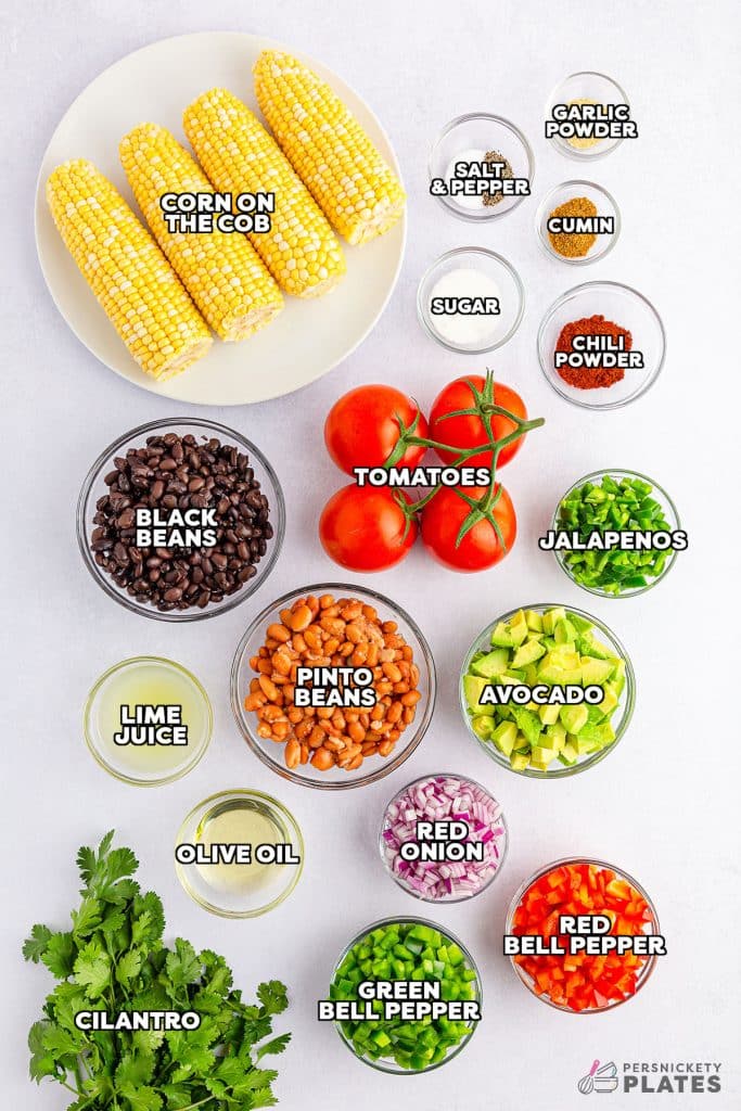 overhead shot of labeled ingredient laid out to make cowboy caviar.