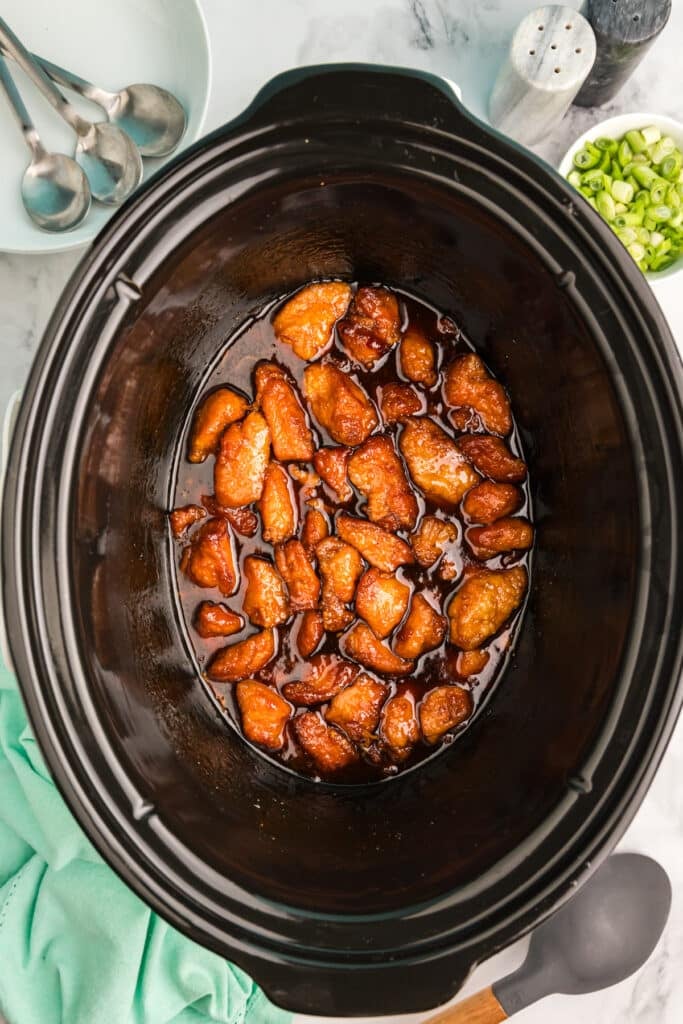 overhead shot of firecracker chicken in a slow cooker.