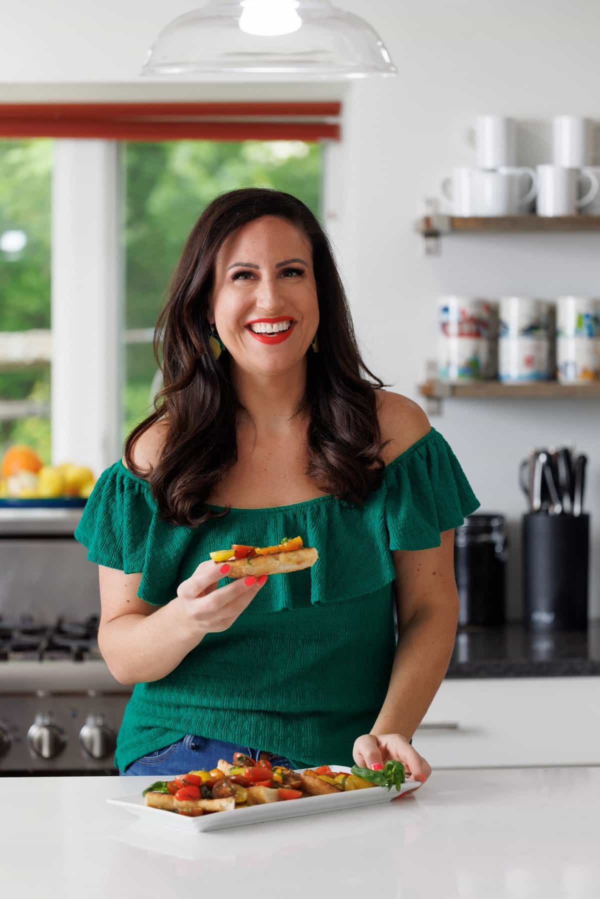 Liz eating grilled garlic bread bruschetta.