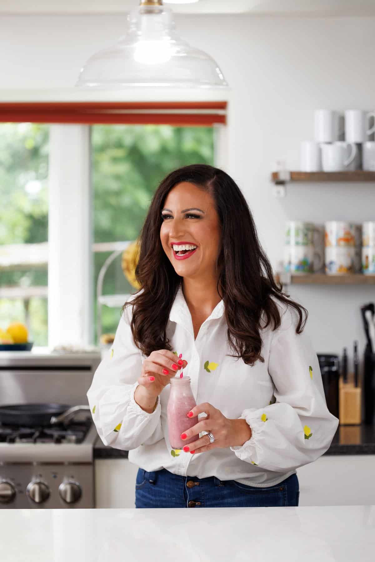 Liz drinking cherry vanilla smoothie.