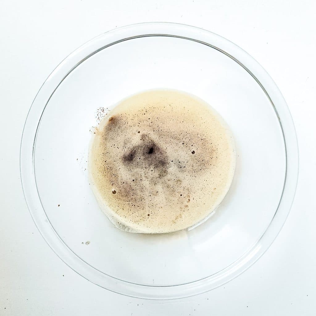 browned butter in a glass mixing bowl.