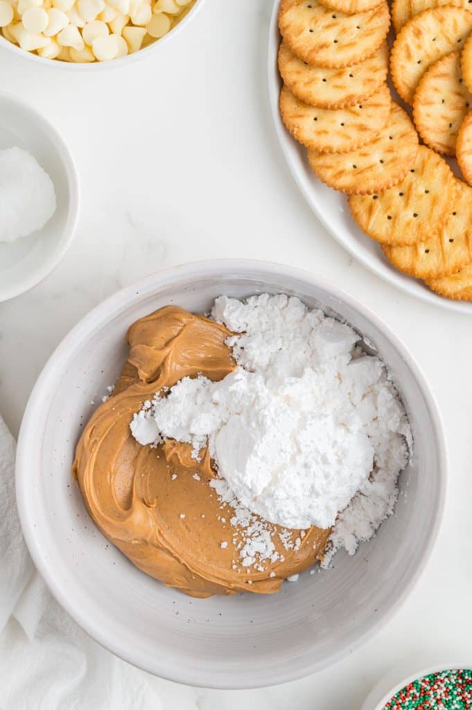 mixing bowl with peanut butter & powdered sugar.