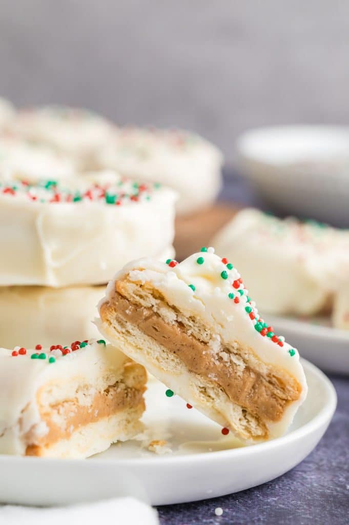 white chocolate ritz cookie cracker cut in half to show peanut butter filling.