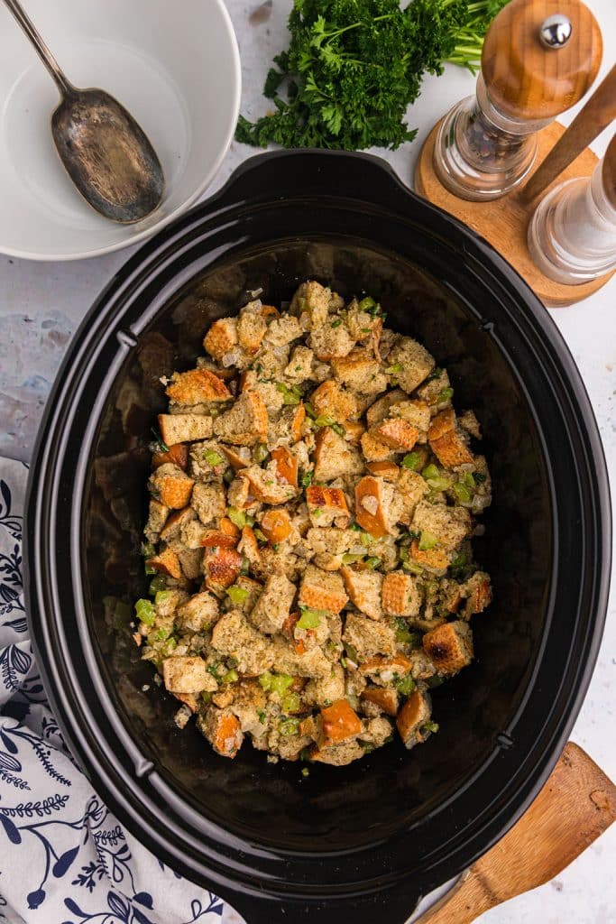 overhead shot of slow cooker stuffing before cooking.