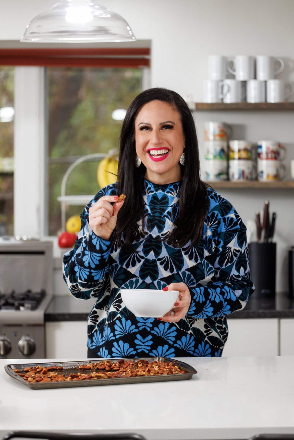 Liz eating Indian spiced mixed nuts.