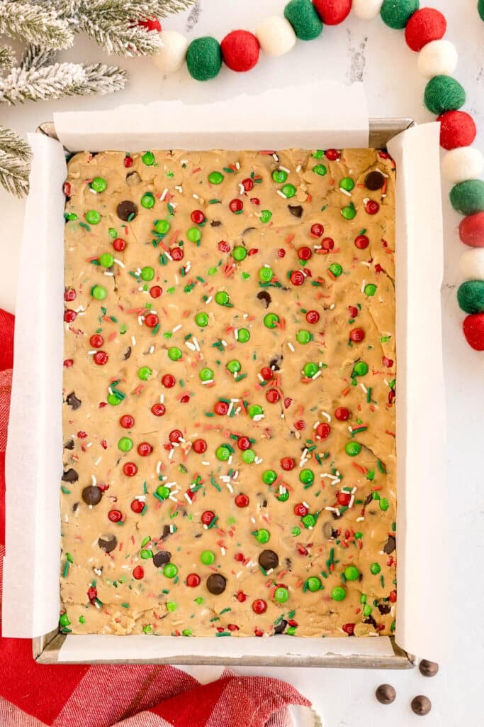 cookie dough pressed into a 9x13 baking dish.