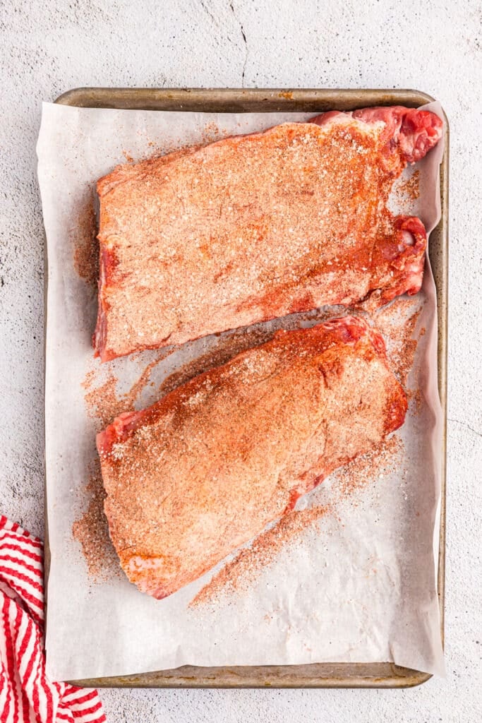 dry rub on two slabs of ribs.