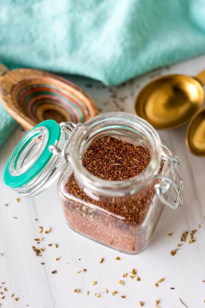 homemade chili seasoning in a glass jar.
