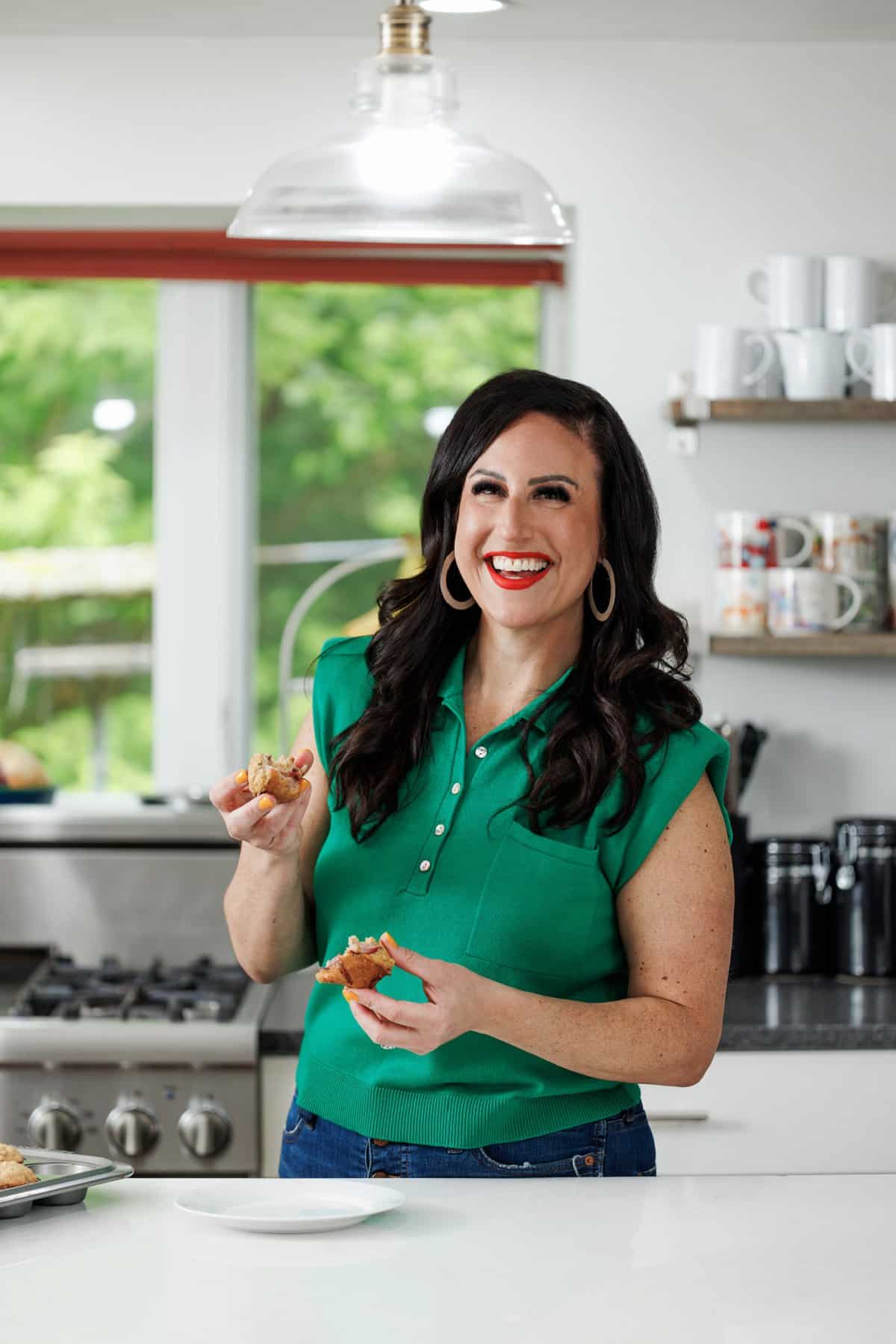 Liz eating strawberry oatmeal yogurt muffins.