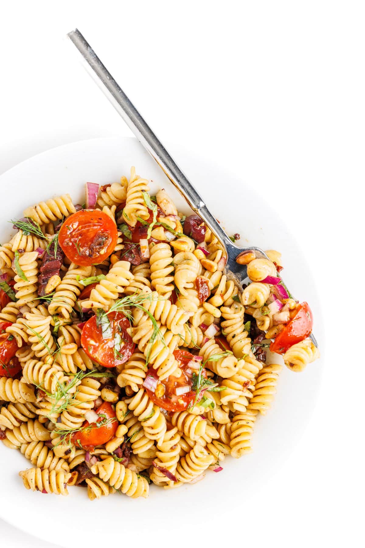 Pasta salad with toasted pine nuts.