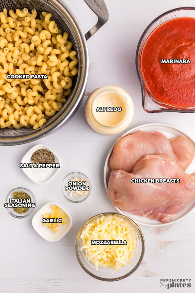 overhead shot of labeled ingredients laid out to make crockpot chicken pasta.