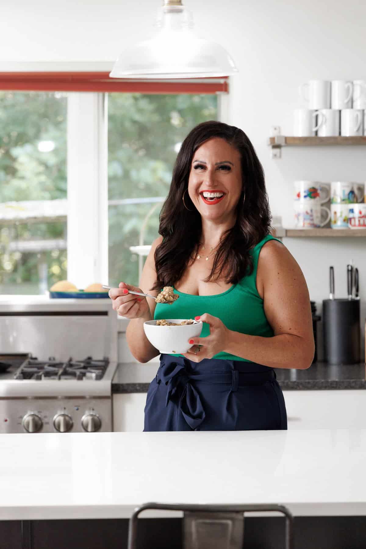 Liz eating maple and brown sugar microwave oatmeal.