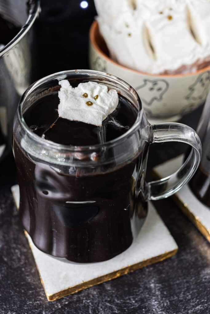 glass mug of halloween hot chocolate.