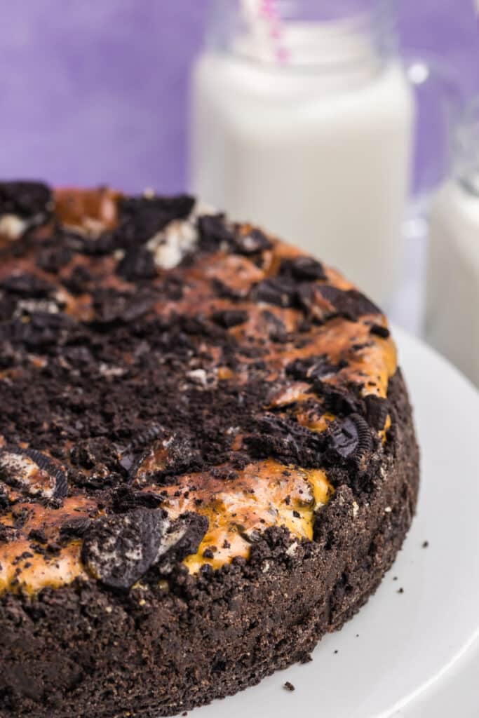 Baked cookies and cream cheesecake on a plate.