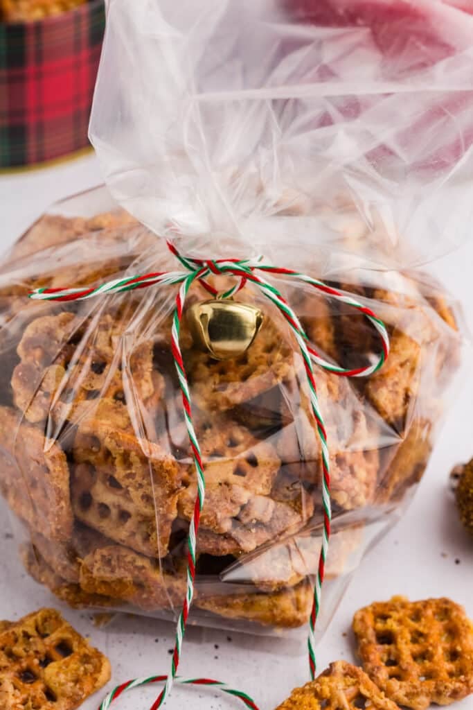 Butter toffee pretzels in a clear gift bag.