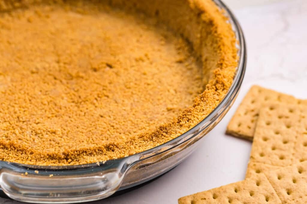 Close-up of graham cracker crust edge.
