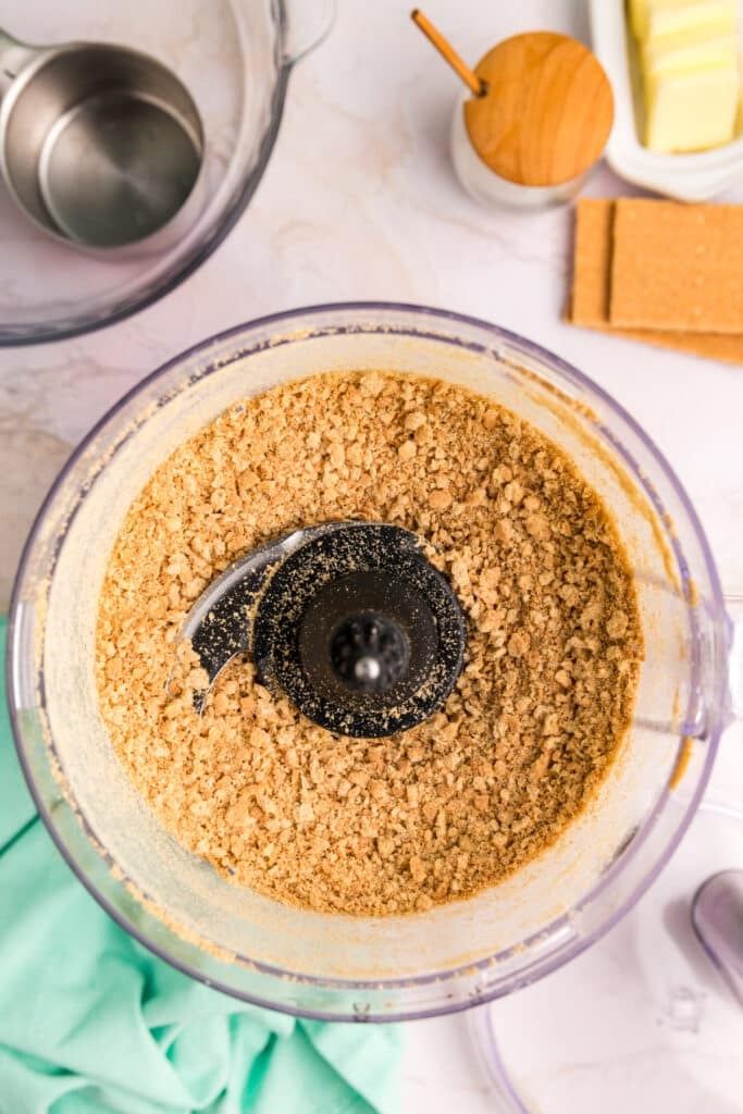 Graham crackers ground into crumbs in a food processor.