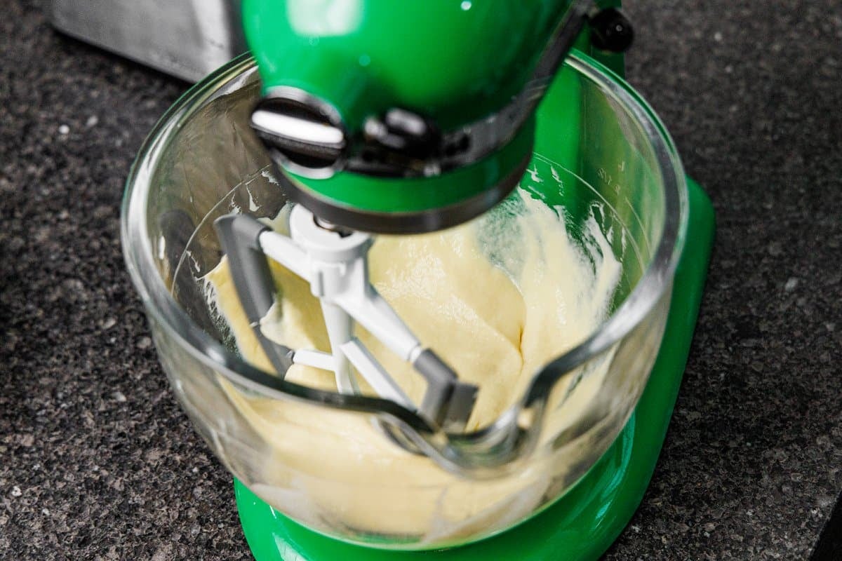 Mixing wet ingredients with a stand mixer.