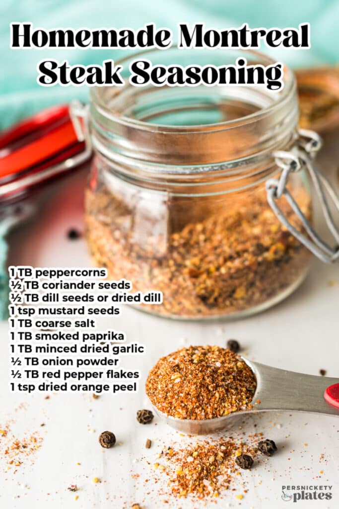 A jar of homemade Montreal steak seasoning with a labeled recipe card listing the ingredients.