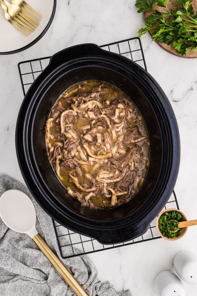 overheat shot of slow cooker beef & noodles.