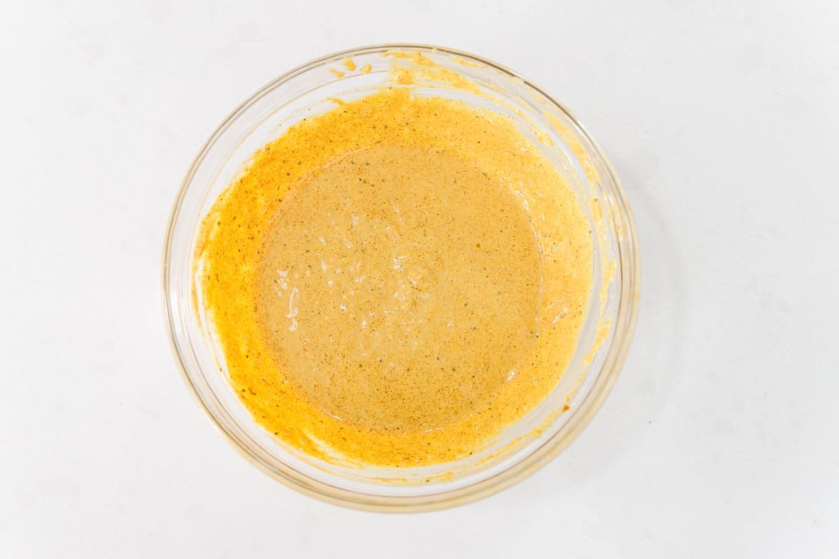 Indian spiced yogurt marinade in a bowl.