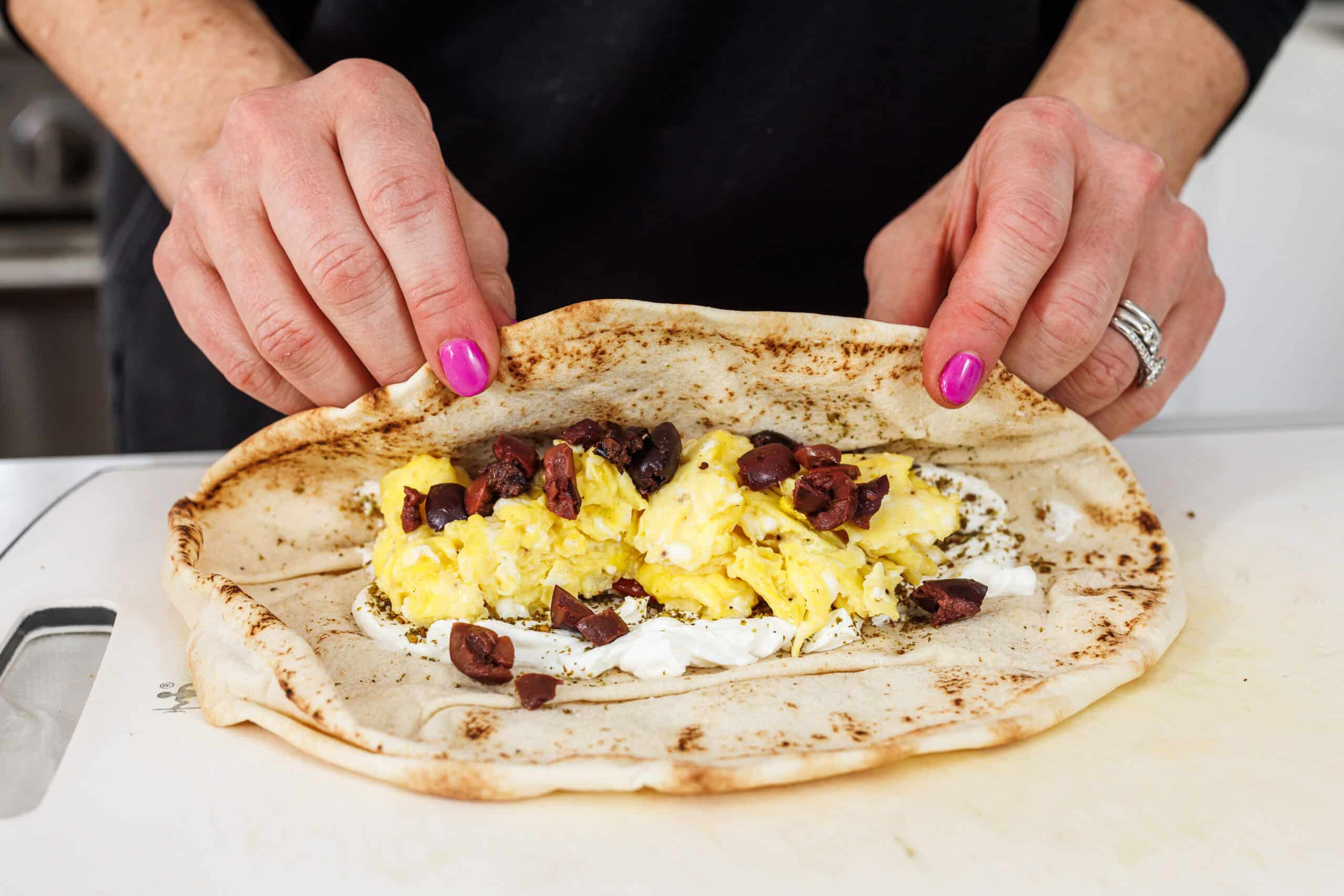 Liz wrapping up Lebanese breakfast pita.