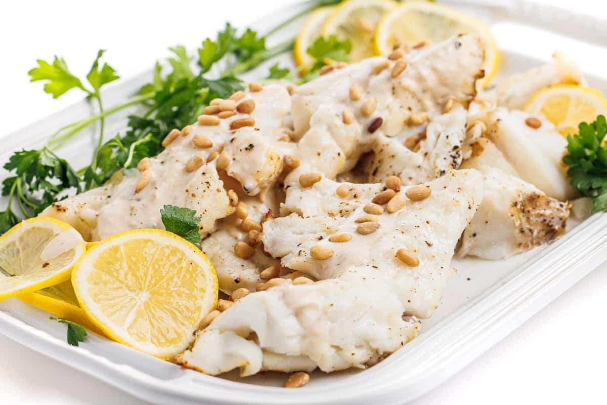 White fish with tahini sauce, a healthy Lebanese recipe.