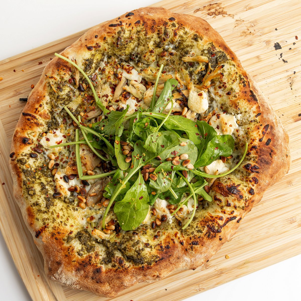 Pesto Chicken Pizza with Goat Cheese & Toasted Pine Nuts