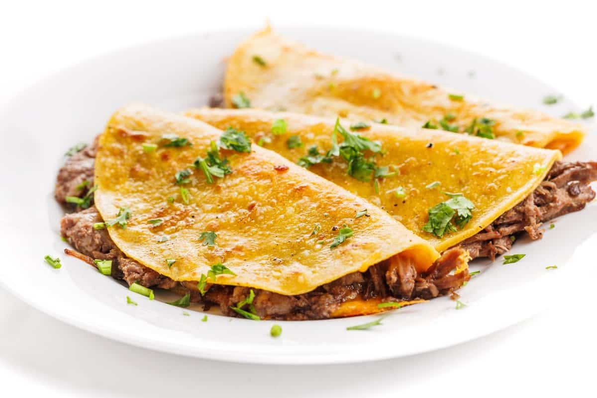 Healthy shredded beef birria tacos.