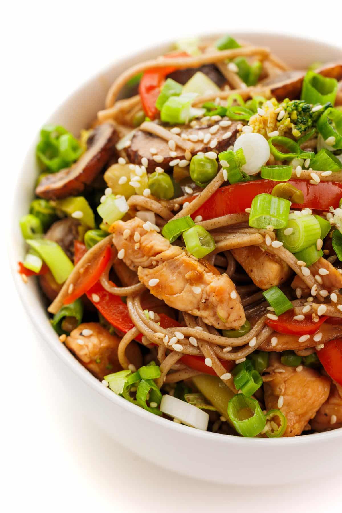 Spicy chicken and soba noodles topped with sesame seeds.