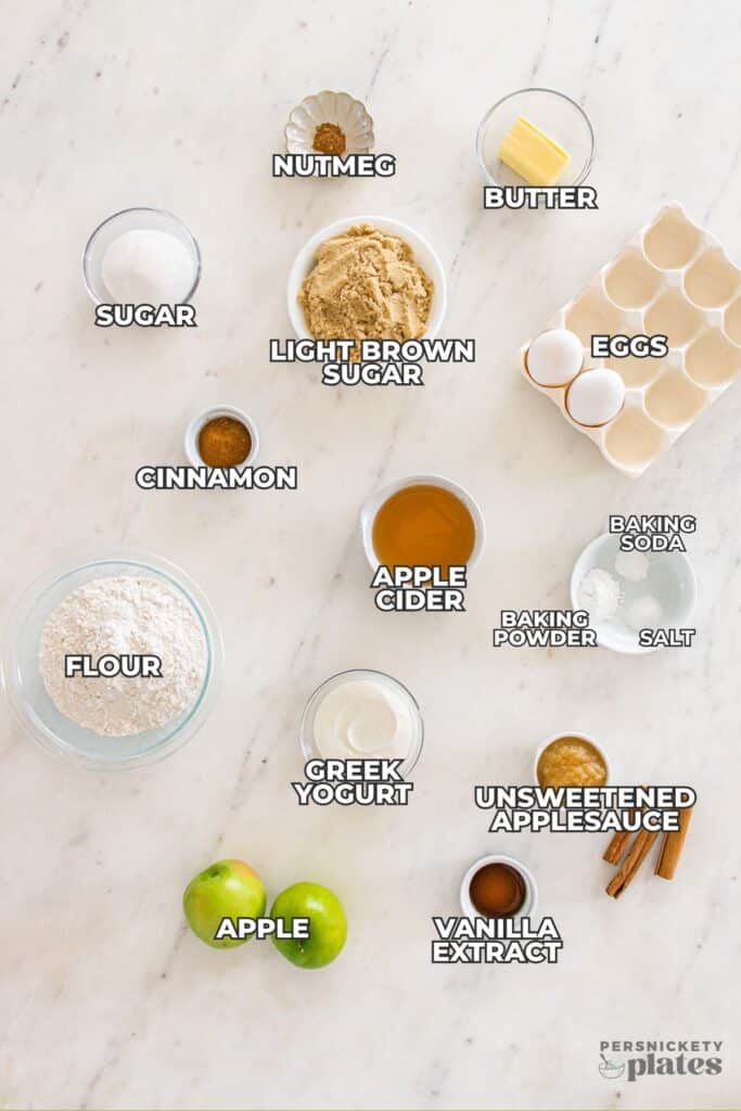 Overhead view of labeled ingredients for apple cider donut bread.